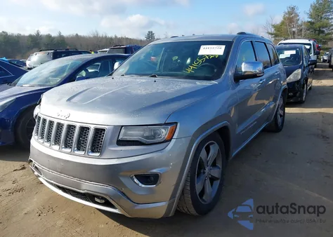 2014 Jeep Grand Cherokee Overland z USA, uszkodzony, nr VIN 1C4RJFCG1EC247145